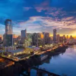 a city skyline at sunset